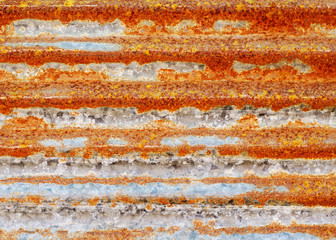 Rusty zinc sheets in background