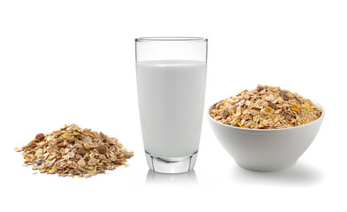 fresh milk in the glass and muesli breakfast placed on white bac
