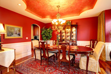 Luxury dining room in bright red color