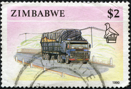 stamp printed in Zimbabwe shows image of a goods lorry