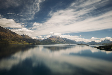 Obraz na płótnie Canvas Reflection of the mountain range on Lake Wakatipu, New Zealand