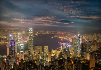 Hong Kong city skyline panorama at night with Victoria Harbor an
