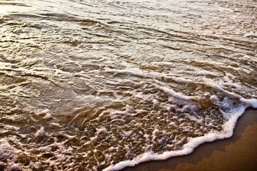 Surface of the sea during sunrise. 