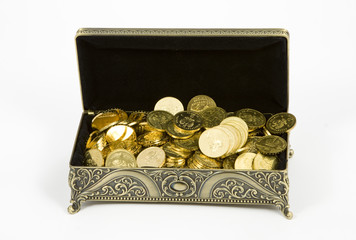  gold casket and gold coins on a white background 	gold casket a