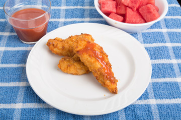 Barbecue Chicken Strips with sauce and Watermelon