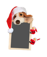 Tafel mit Plüschhund und Weihnachtsmütze und Nikolaus