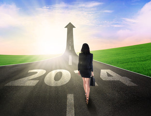 Businesswoman walking on the road