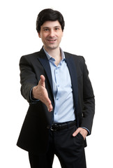 Businessman Holds Out His Hand For A Handshake