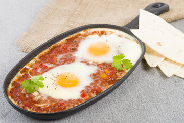 Huevos Rancheros - Eggs poached in tomato sauce
