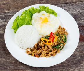 Rice topped with stir fried minced pork and basil
