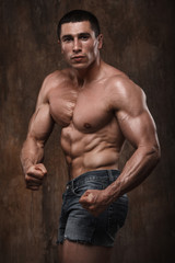 Obraz na płótnie Canvas Strong muscular man. Naked torso.