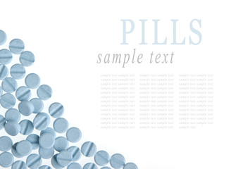 Blue pills background isolated on white