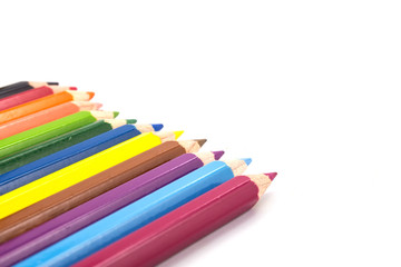 colorful pencils on white background
