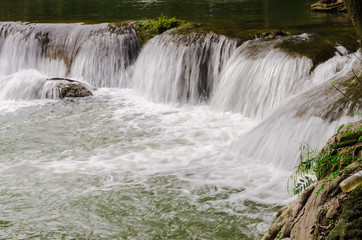 Fototapeta na wymiar Waterfalll at Num Tok Chet Sao Noi National Park, Thailand