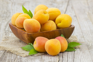 Naklejka na ściany i meble fresh apricots in a bowl