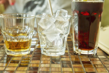 Whiskey, ice and Cola