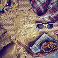 Accessories cowboy retro style on wooden background