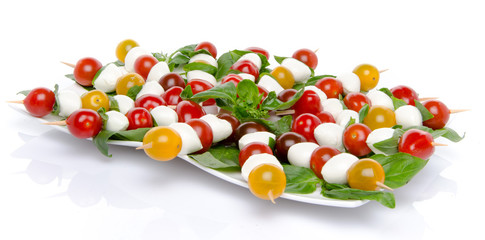 Fototapeta na wymiar Cherry tomatoes and mozzarella on skewers