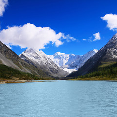 Fototapeta na wymiar beautiful mountain lake at the foot of the mountain