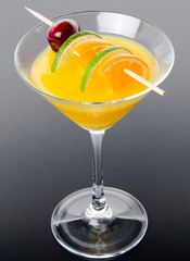 Orange cocktail on a gray background