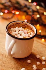 chocolate with marshmallows on table