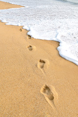 footprints on beach