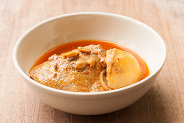 Close up Muslim style chicken and potato curry or chicken mussam