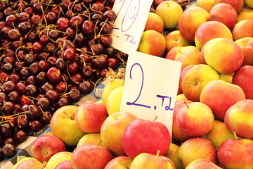 Apples and cherries on a turkish market stall