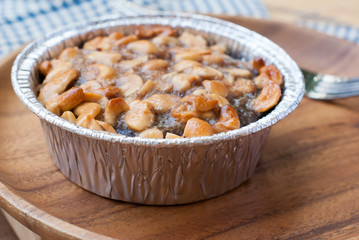Close up image of walnut toffee cake