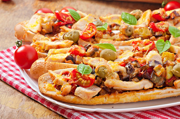 Big sandwich with roasted vegetables and chicken