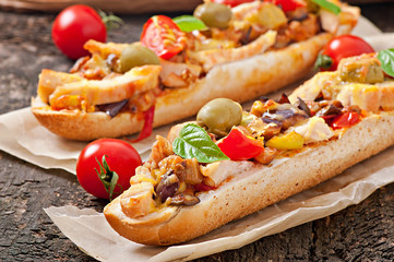 Big sandwich with roasted vegetables and chicken