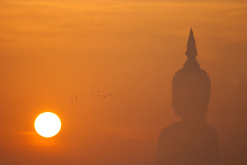Big buddha statue at sunset