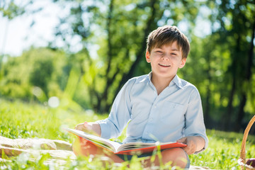 Boy in summer park