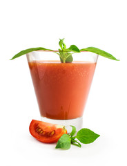 tomato juice with basil in a glass