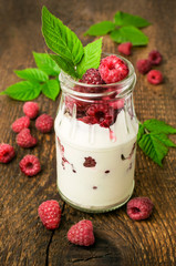 Raspberry dessert in a glass jar