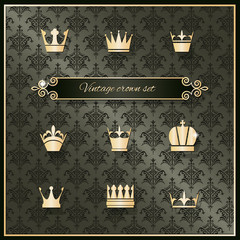 Gold crown icons set on damask. Luxury design elements.