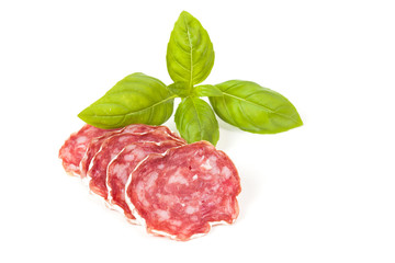 Salami sliced on the white background