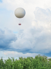 Tethered aerostat balloon. Place for text.