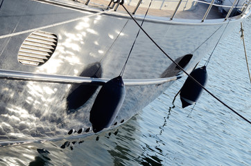 Two boat fenders, protecting the side of a sailing vessel