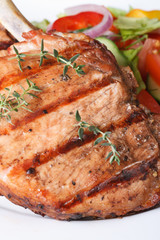 Grilled pork macro and salad with vegetables vertical