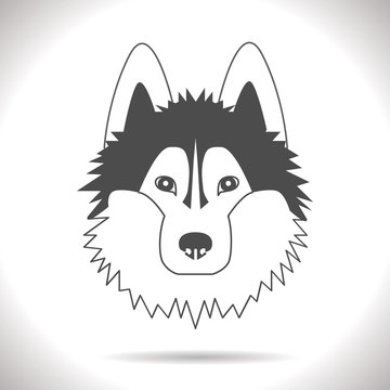 black image of a dog on a gray background