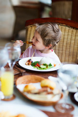 Little boy eating lunch