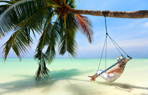 Young Woman Relaxing At Beach