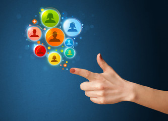 Social media icons coming out of gun shaped hand