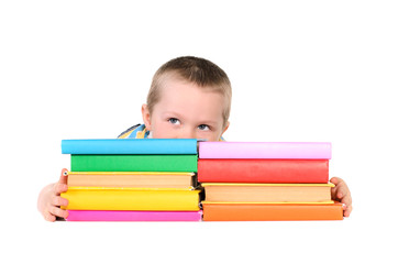 boy with piles of colored books