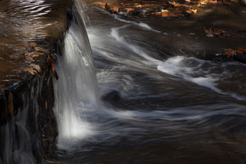 Small waterfall in the autumn