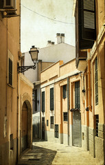 Fototapeta na wymiar Narrow street in old city of Palma de Mallorca, Spain