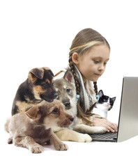 child and puppy and laptop
