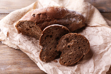 Fresh bread on wooden background