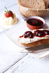 Fresh toast with homemade butter and strawberry jam